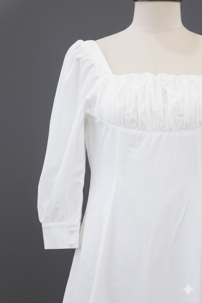 Bella Blanc Puff Sleeve Mini Dress!